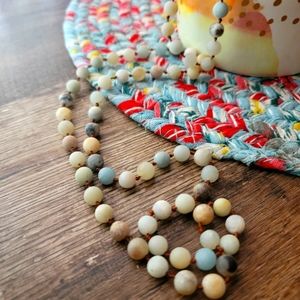 Long knotted silk strand of gemstone/frosted beads... 😍 soft earthy tones